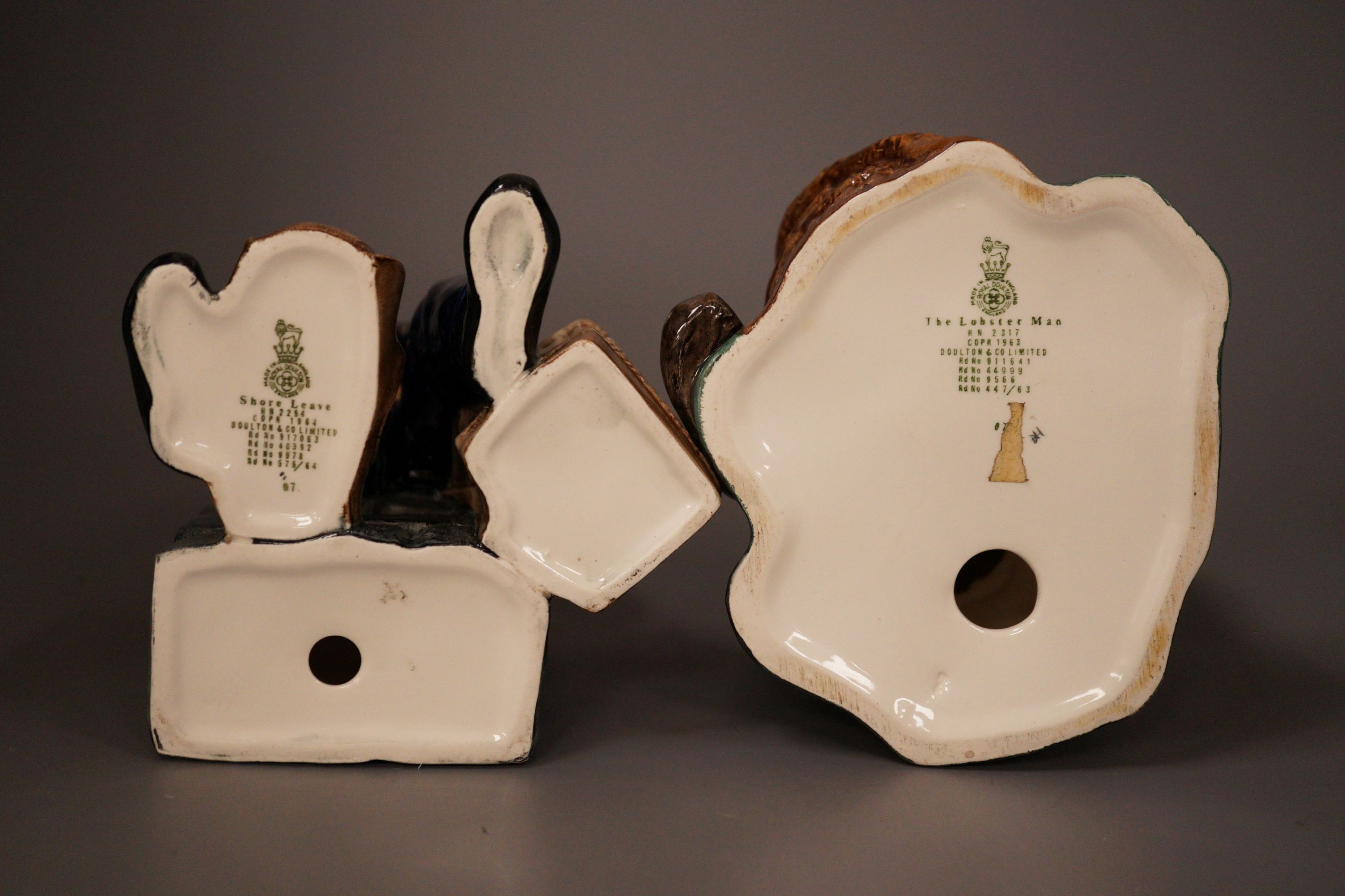 Two Doulton figures - The Lobster Man HN 2317 and Shore Leave HN 2254